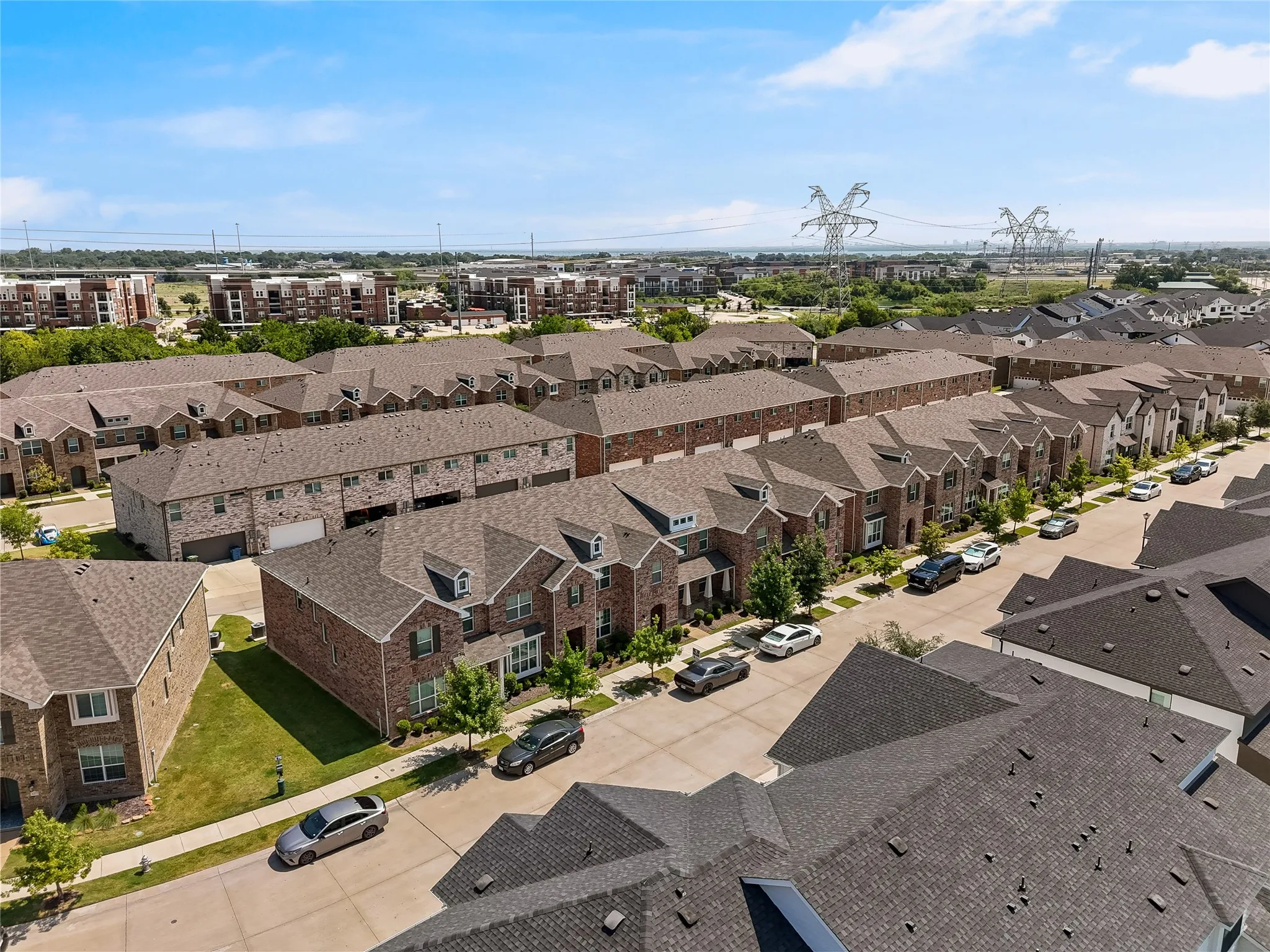 Brick townhome community featuring well-proportioned units with traditional architectural styling