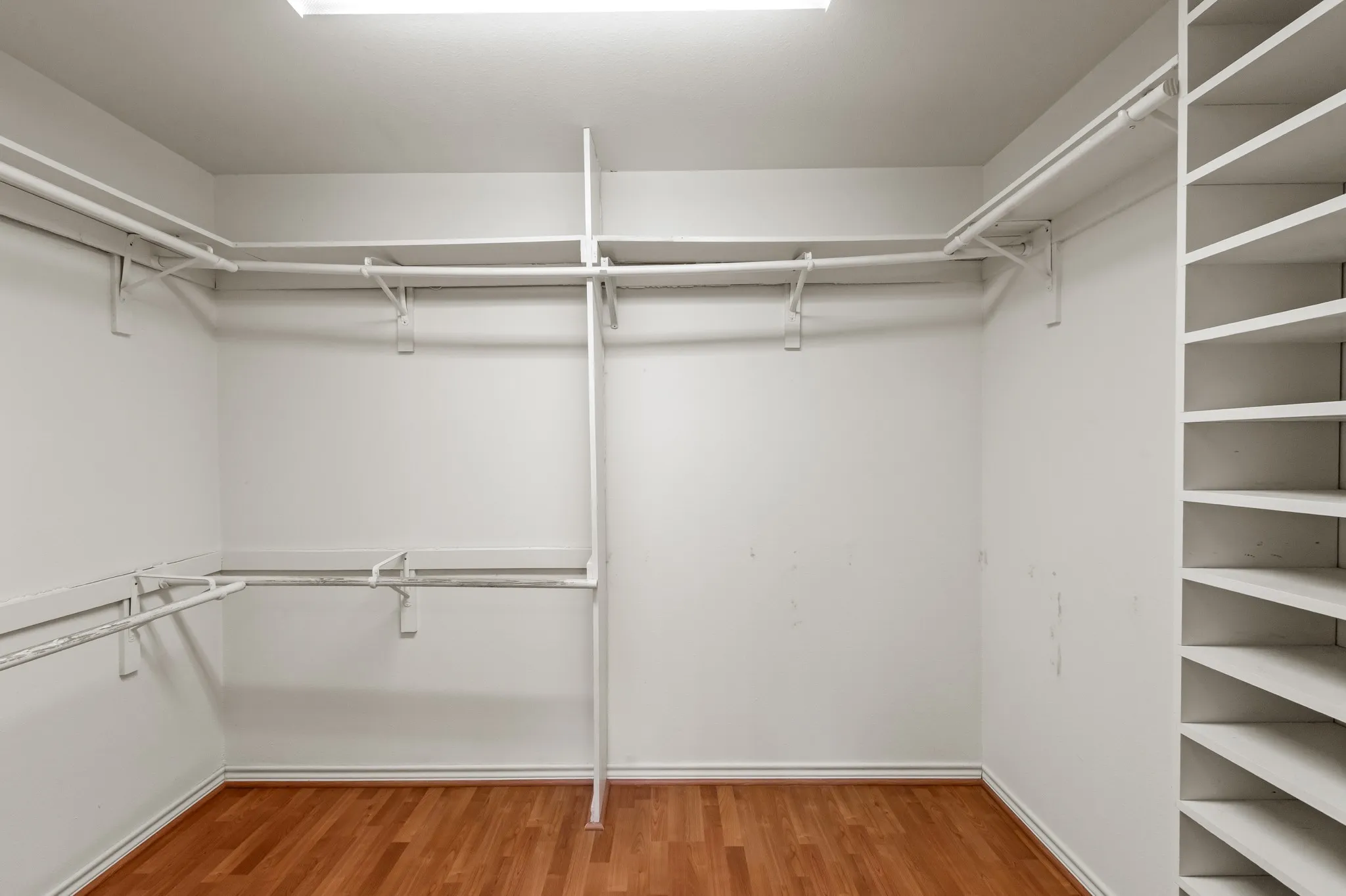 Primary walk in closet.