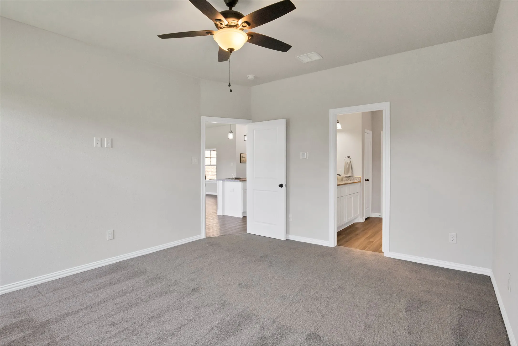 Ceiling fans in all bedrooms. Carpet is standard in bedrooms but you have choices there also!
