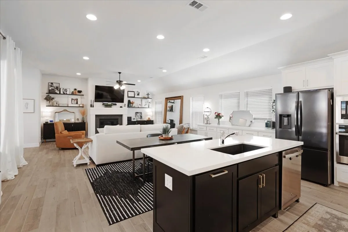 The kitchen features a beautiful large island for seating and storage.