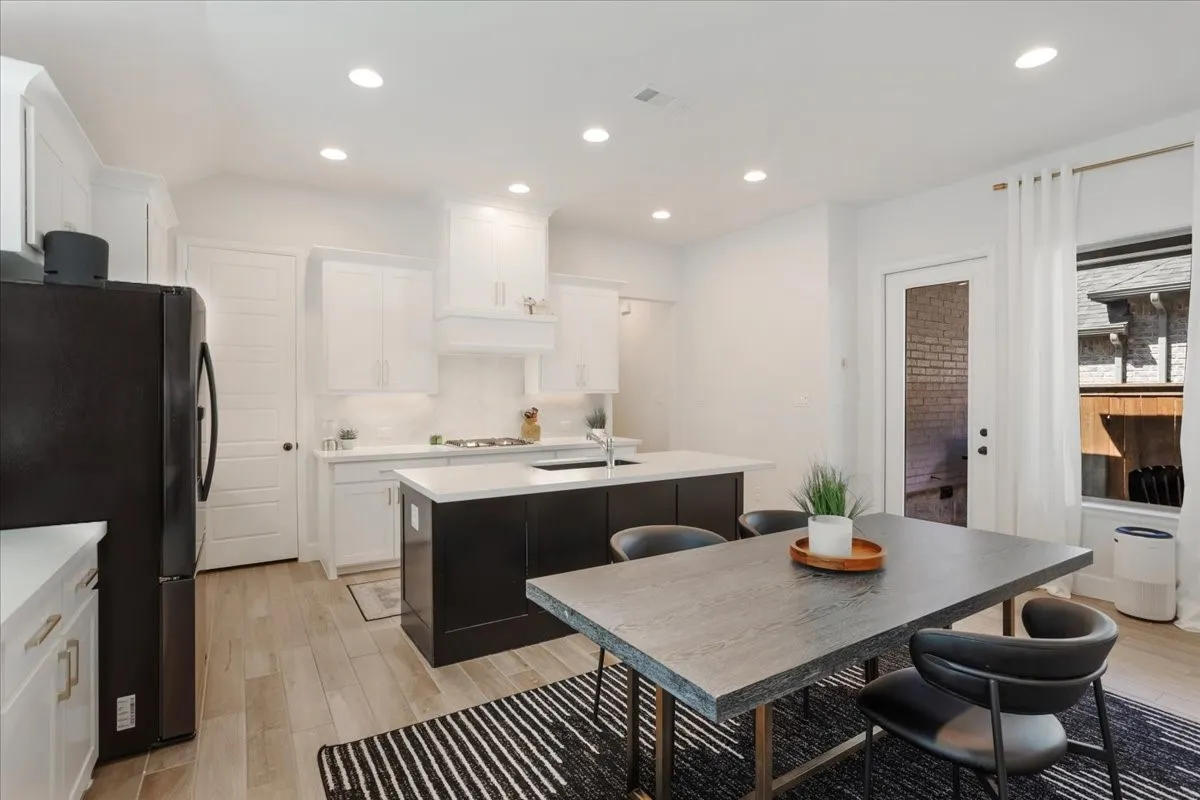 Gorgeous open kitchen featuring large island and corner walk-in pantry!