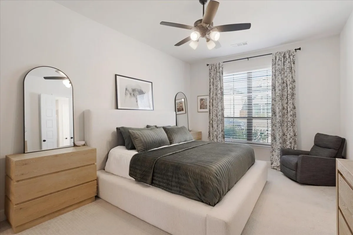 Great sized primary bedroom for all of your large furniture.