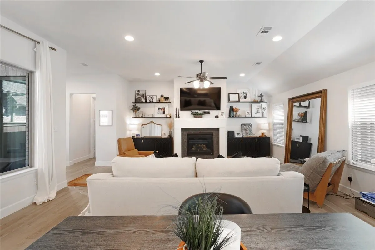 The dining area looks over the living room.