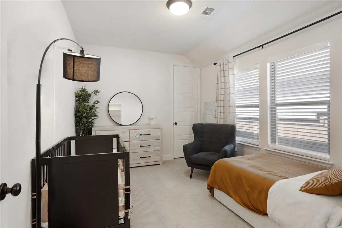 This guest bedroom has an extended large walk-in closet for extra storage!