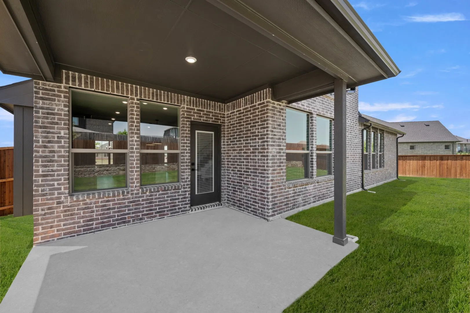 DFW-Redden Farms-Concept 3135-404 Brahman Lane-Back Exterior-Risewell Homes-3