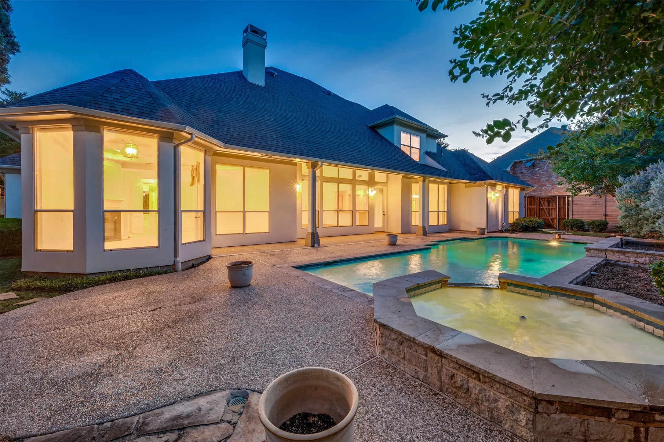 Resort-style backyard paradise featuring a private pool on the largest lot in the subdivision.