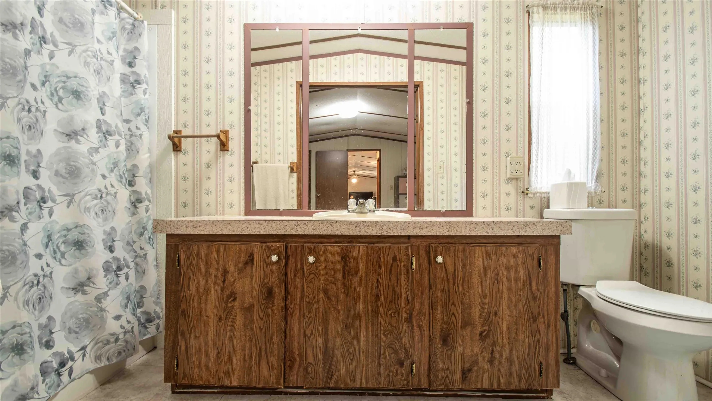 large vanity in guest bath.
