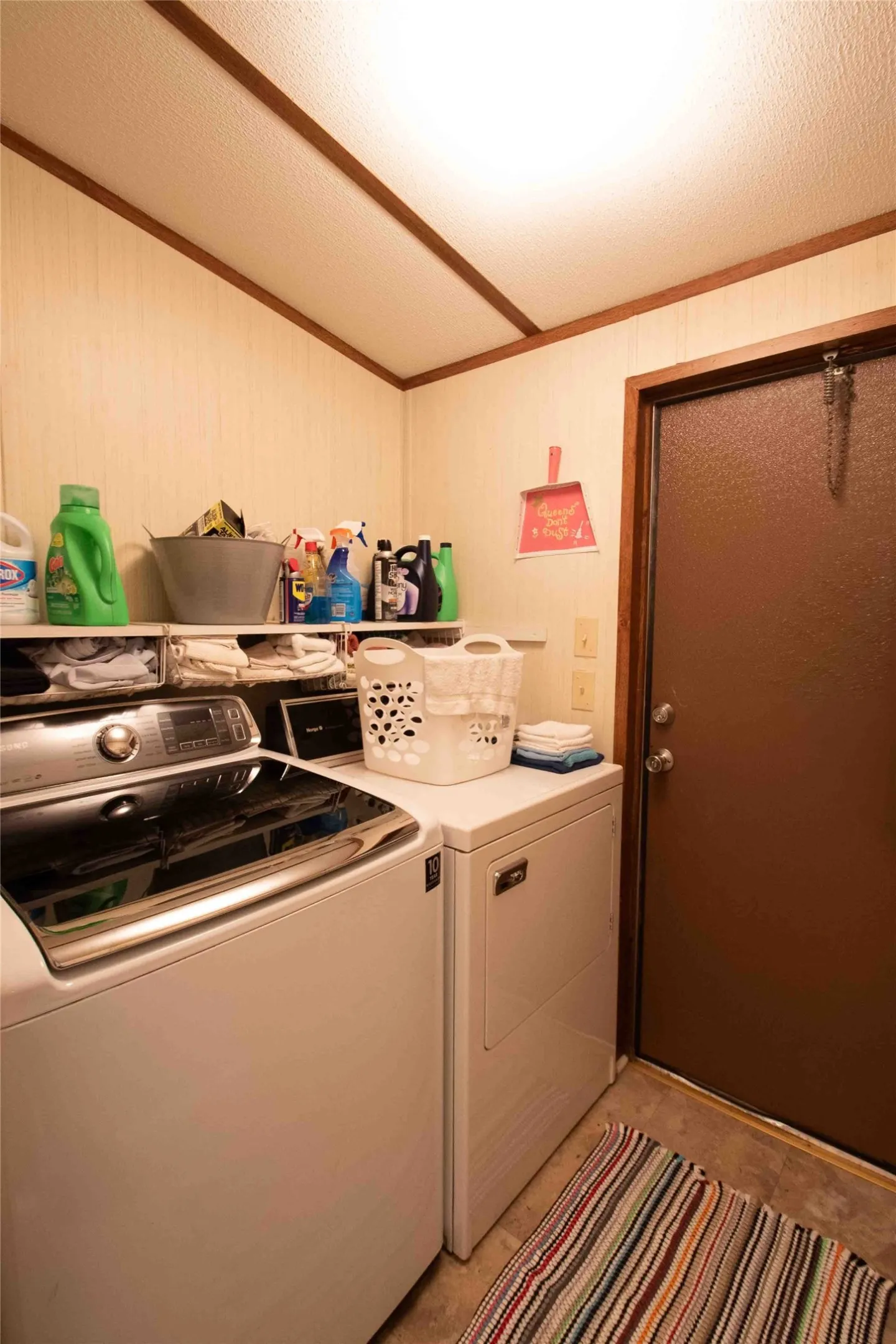5x6 laundry room with door to back deck