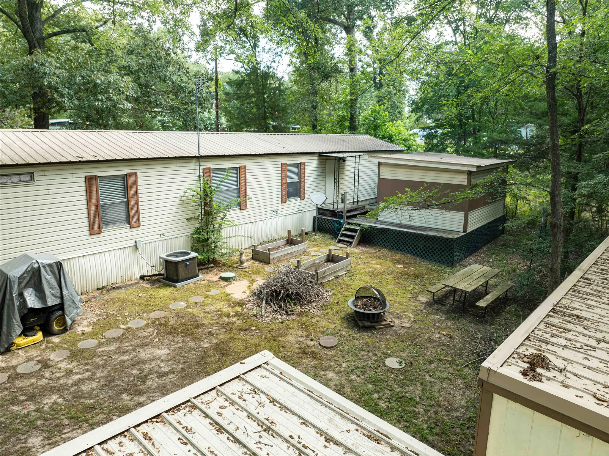 view of back deck with storage building