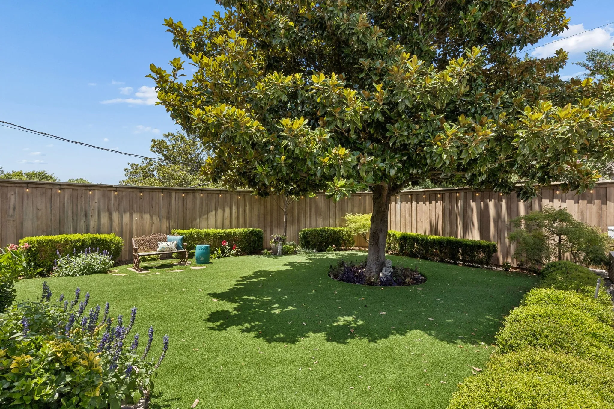 Yard with Turf grass for easy maintenance.