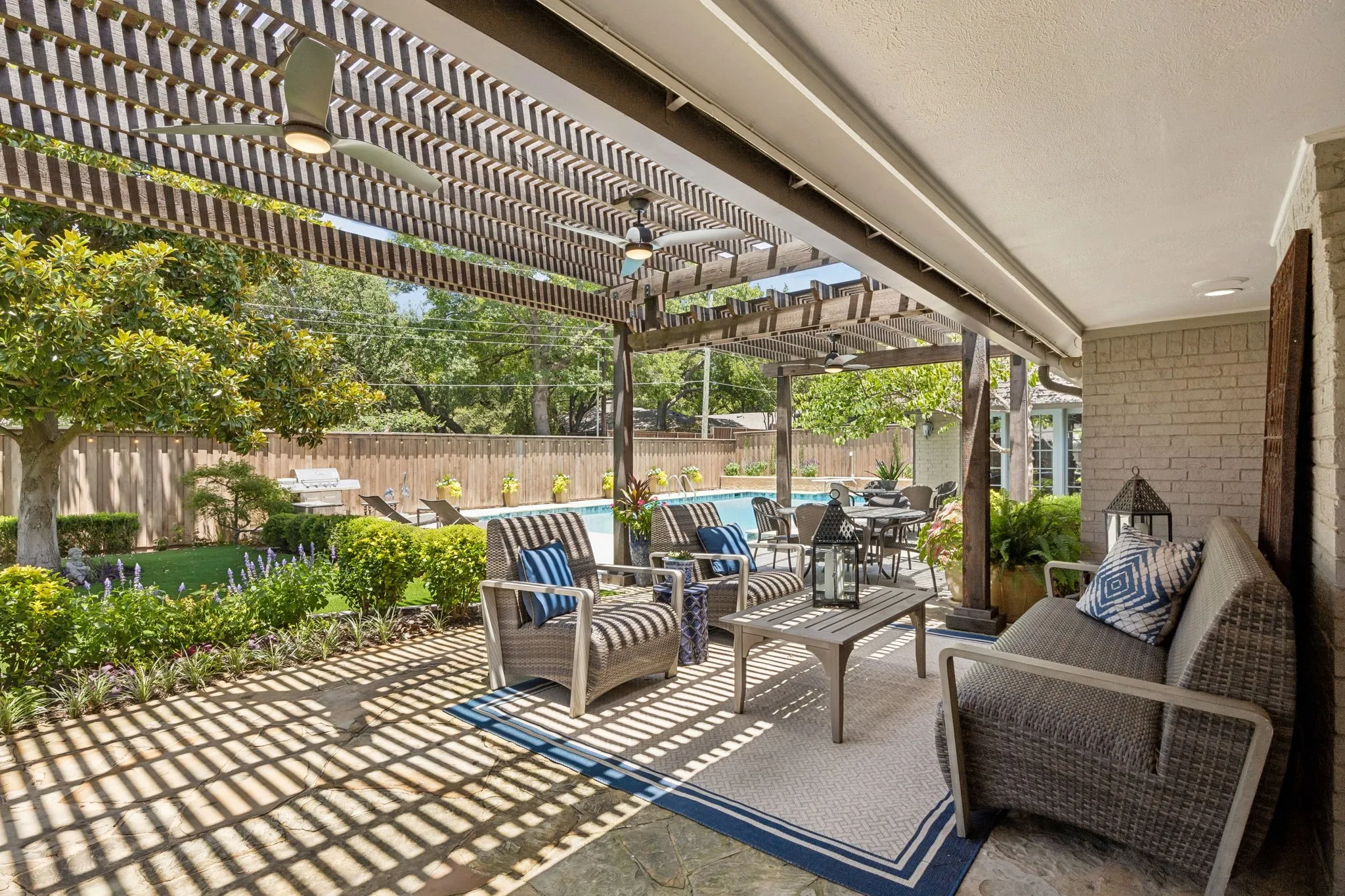 Multiple Covered Patio areas for Entertaining or Relaxing with 3 ceiling fans.