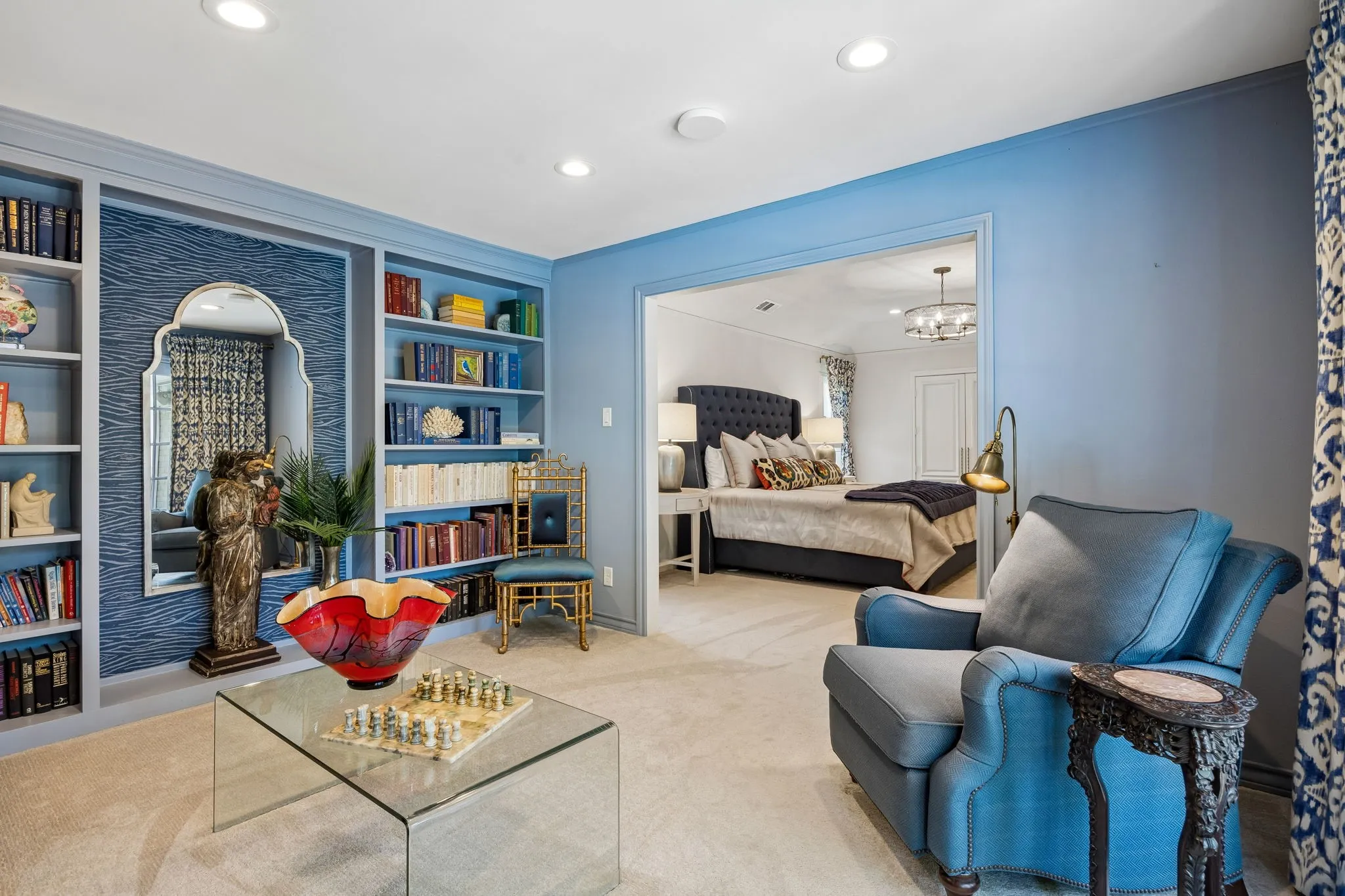 Sitting Room off the Primary with Built in Bookshelves.
