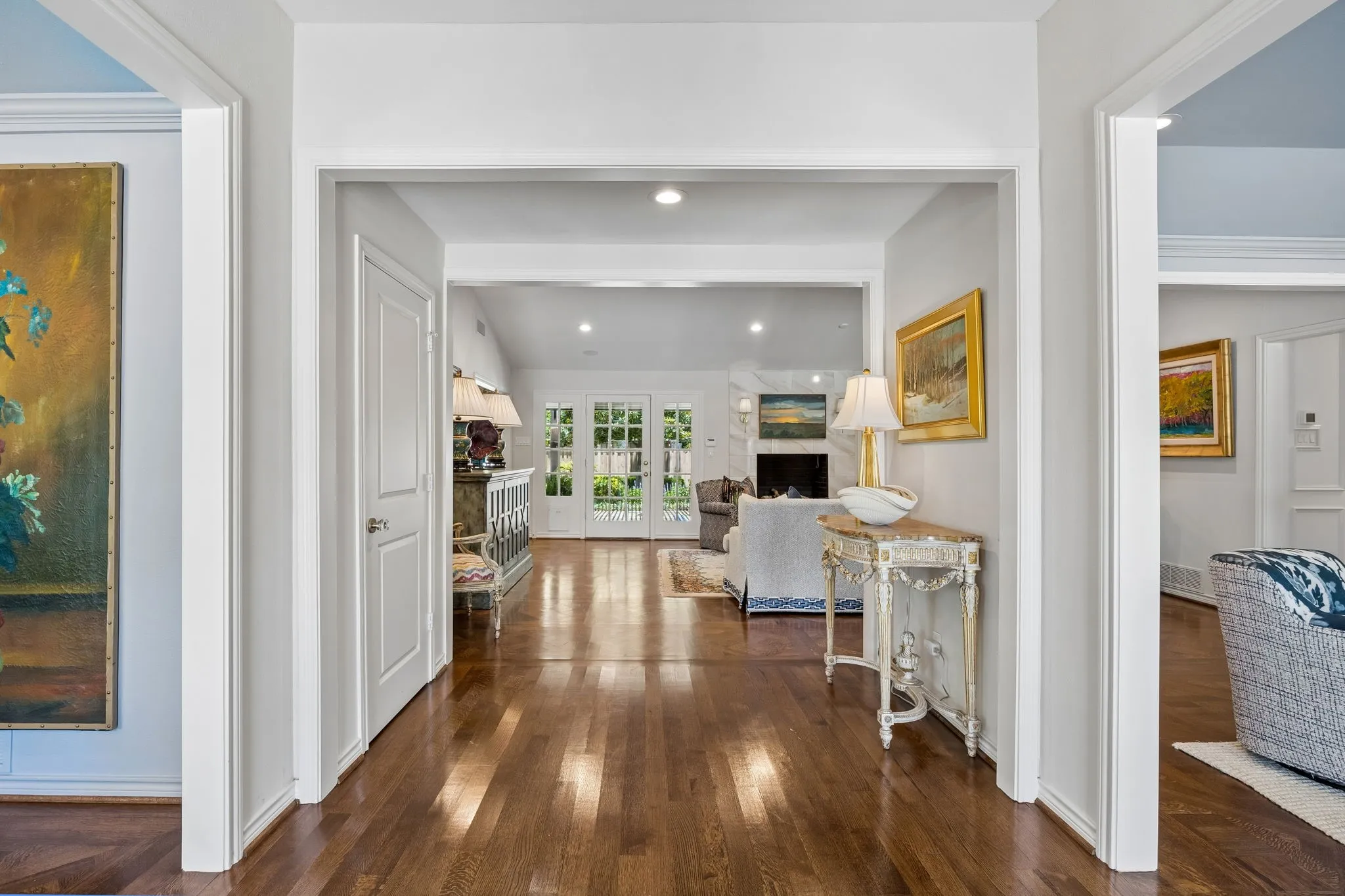 Entry with Split Formals on each side and open to the Family Room.