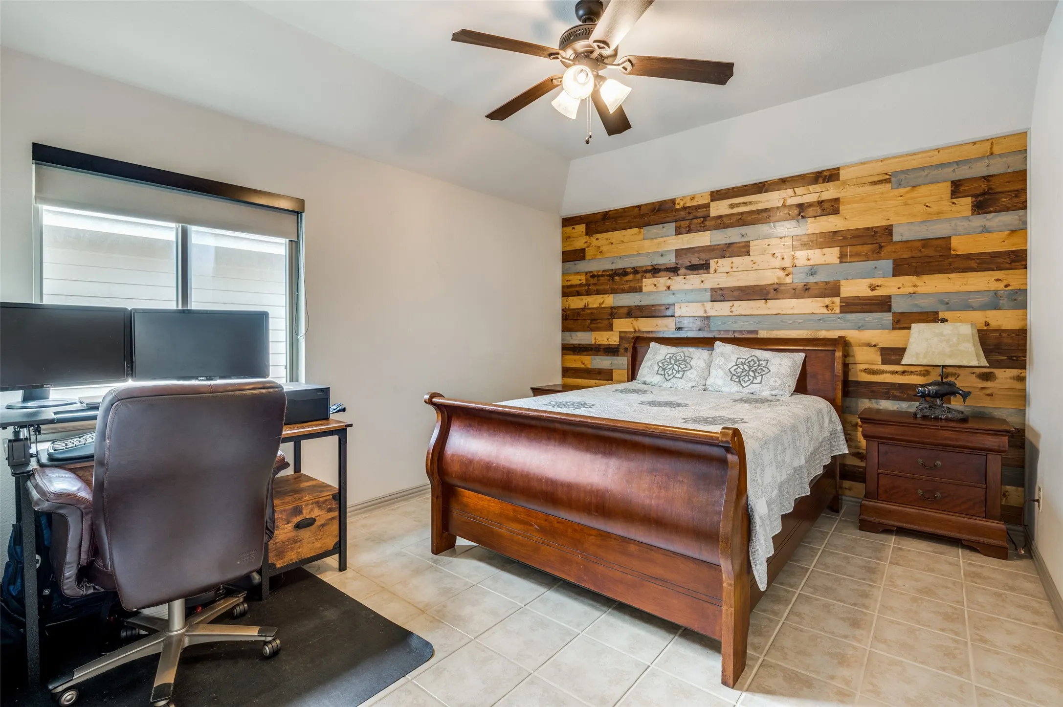 Accent wall featuring horizontal wood planks in varied tones