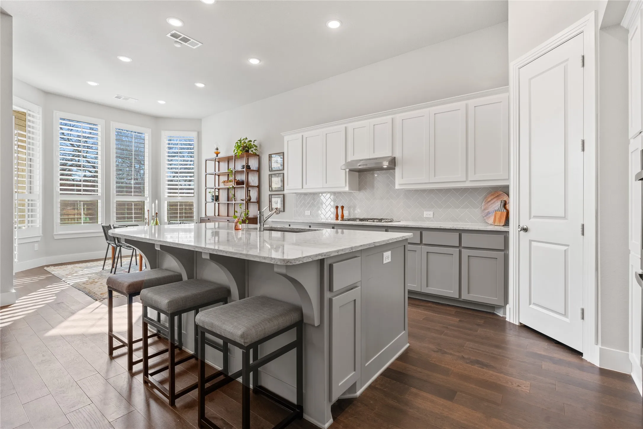 Kitchen island overlooks family room