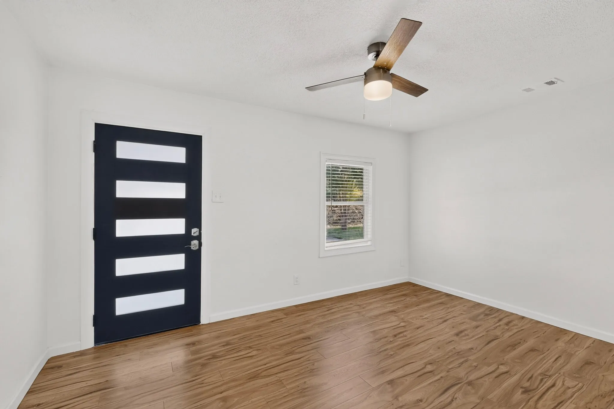 Wood-finish flooring throughout