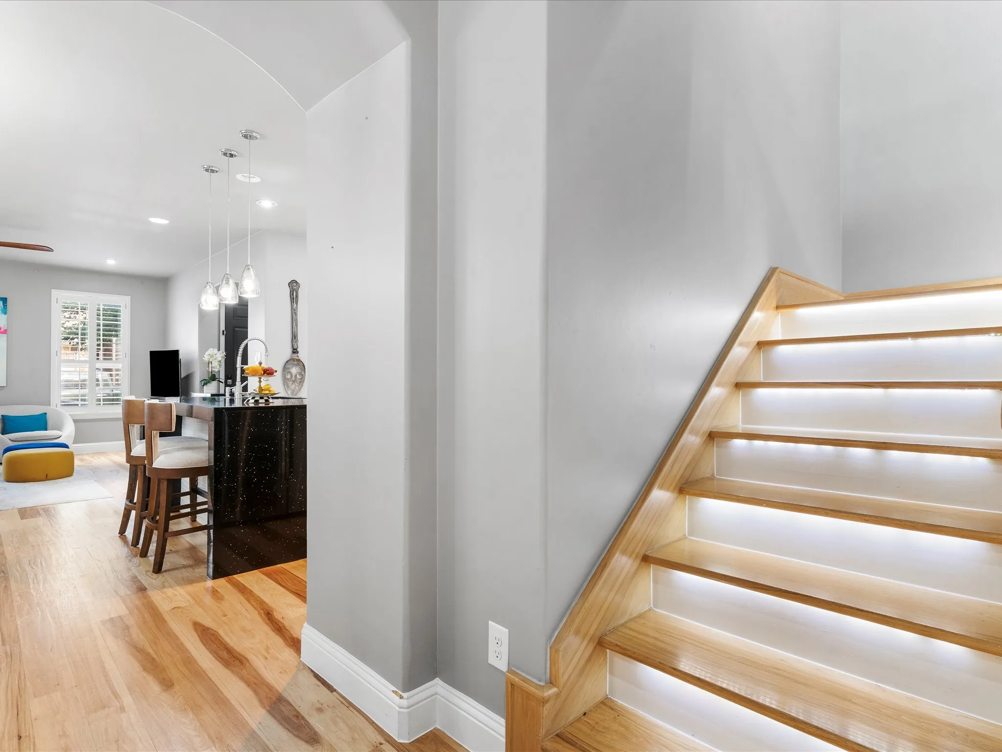 Hardwood staircase with integrated tread lighting