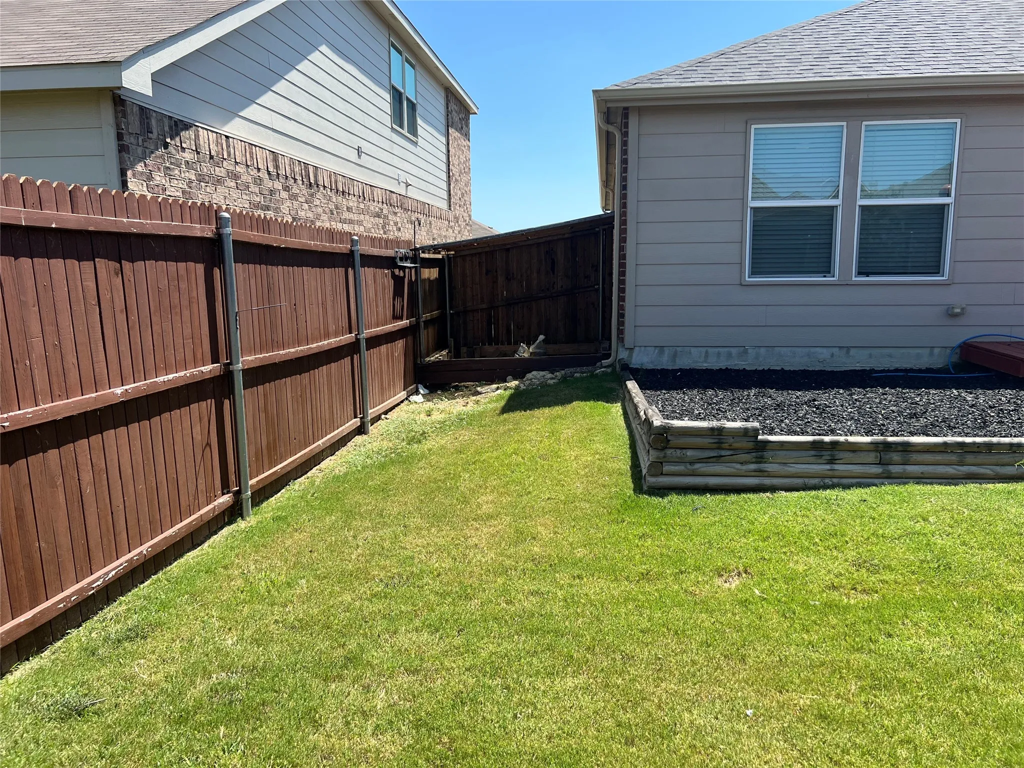Fenced backyard.