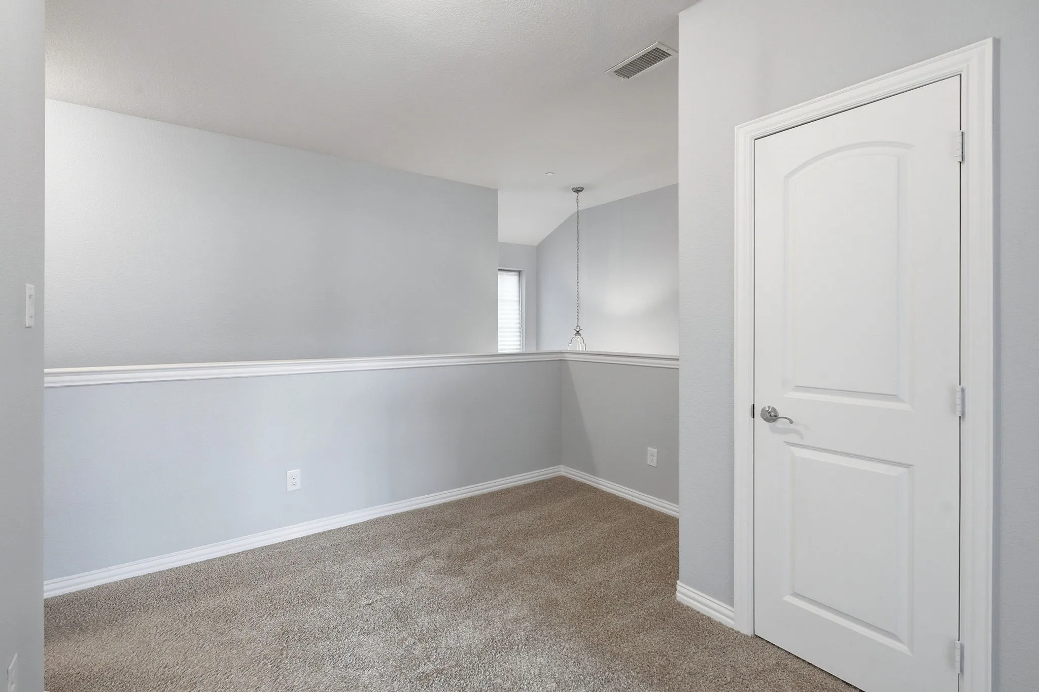 Upstairs game room and linen closet view.