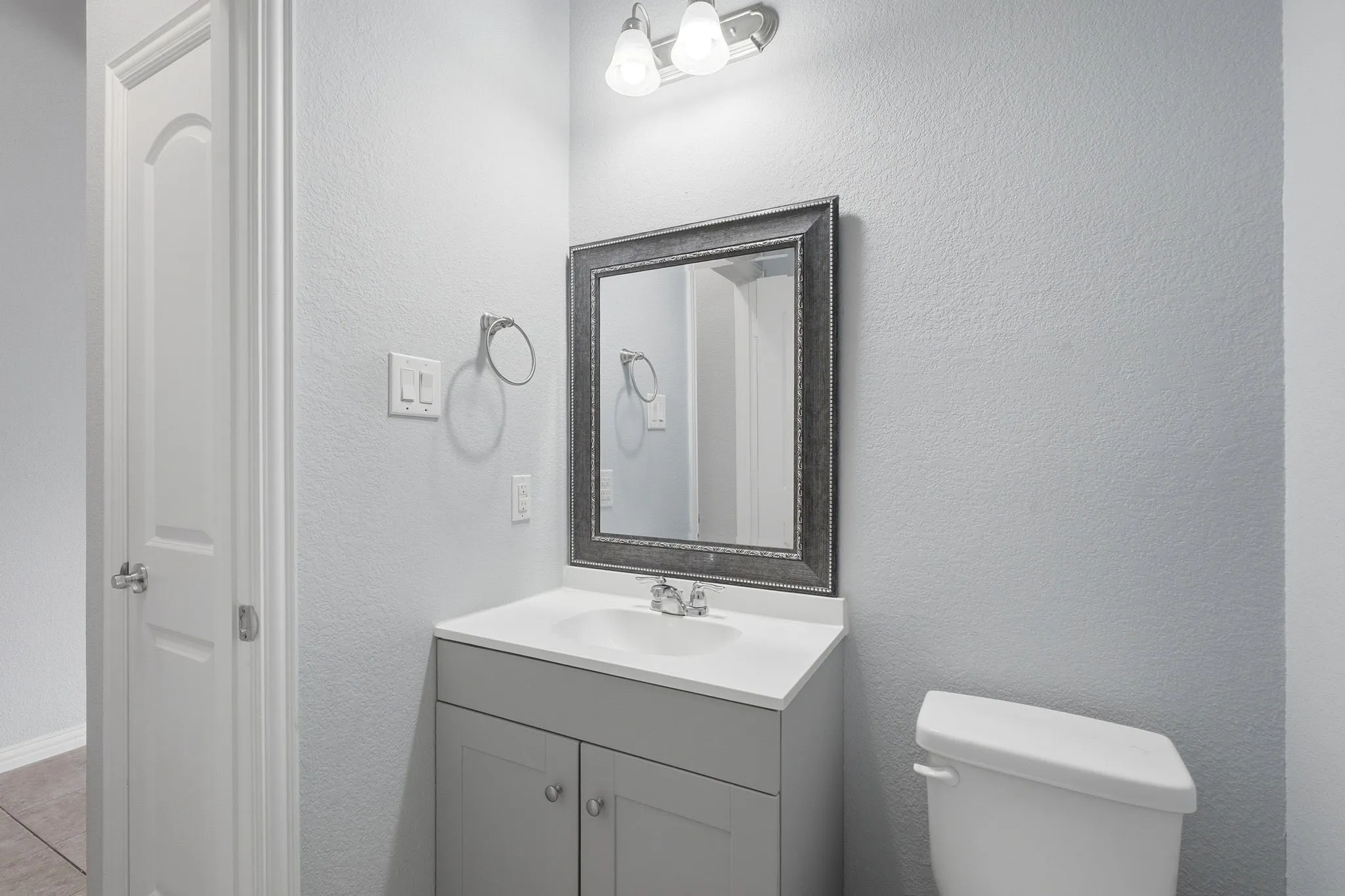 Half bath on the main level for convenience.