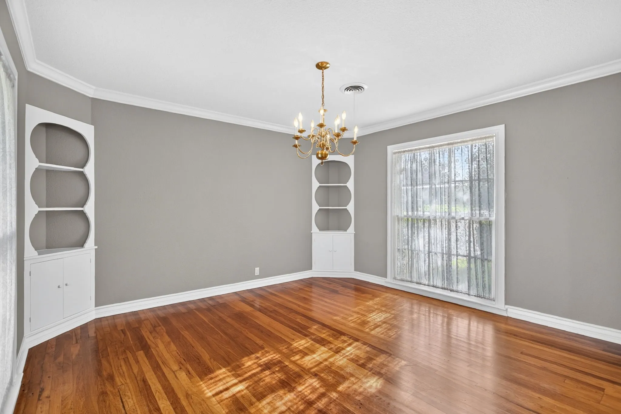 Another view. Spacious with enviable windows that reach all the way to the floor.