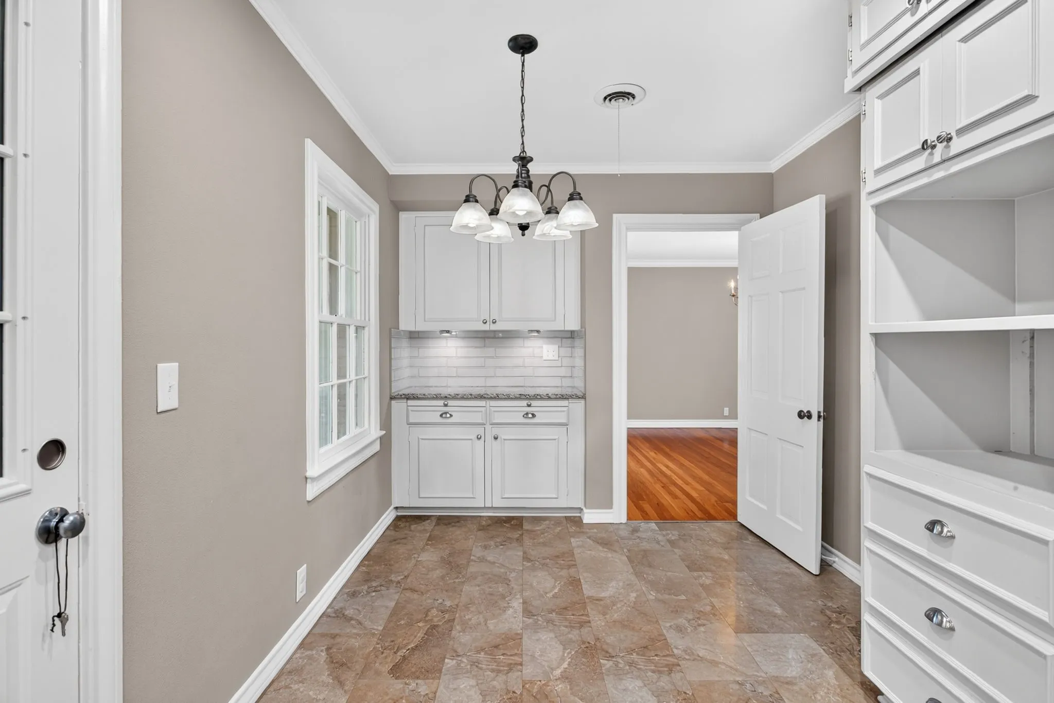 Another view. The breakfast bar was added years ago - and matches the rest of the kitchen perfectly.