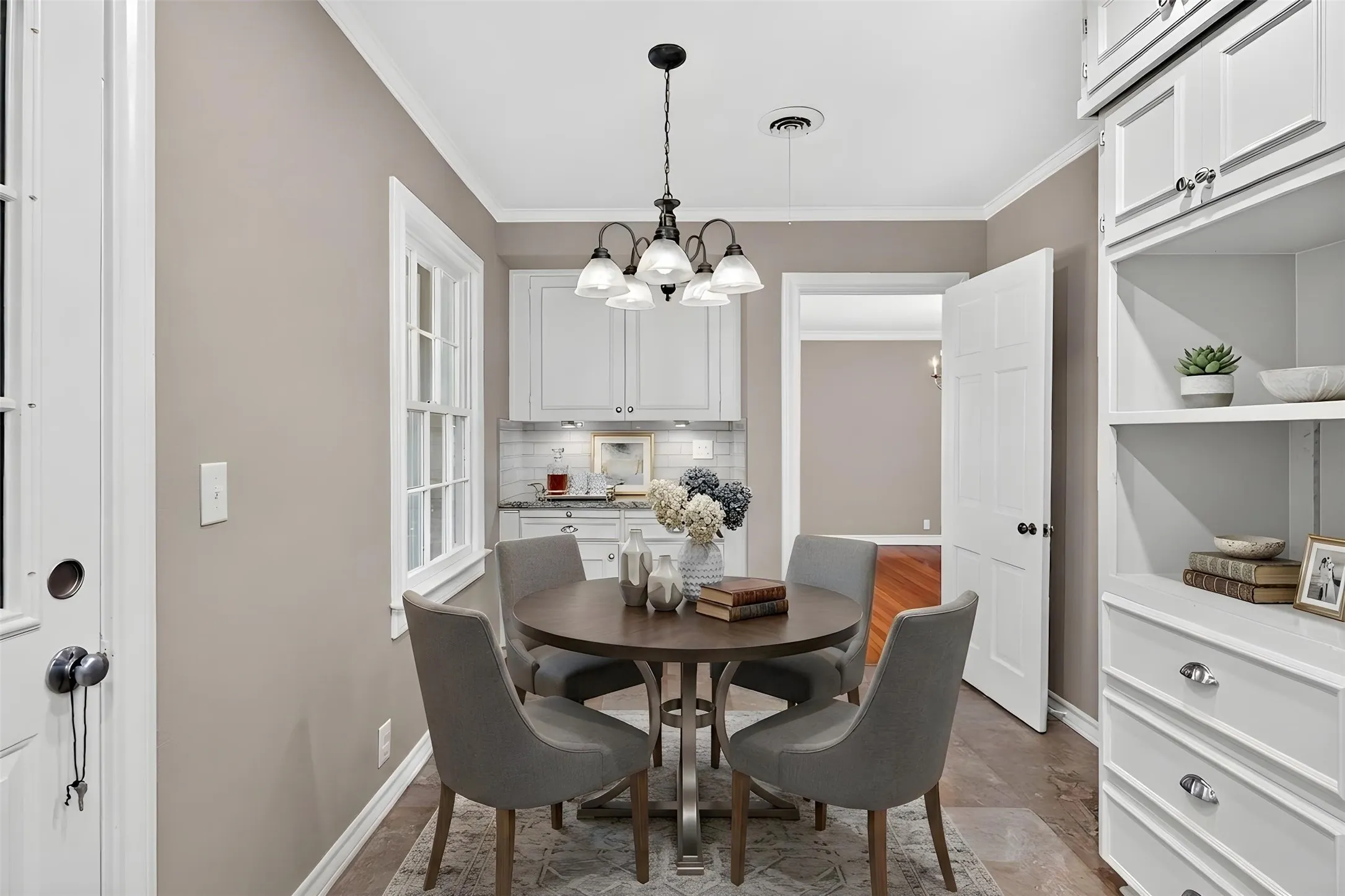 Virtually Staged: Sweet breakfast area serves as a second dining space - perfect for morning coffee.