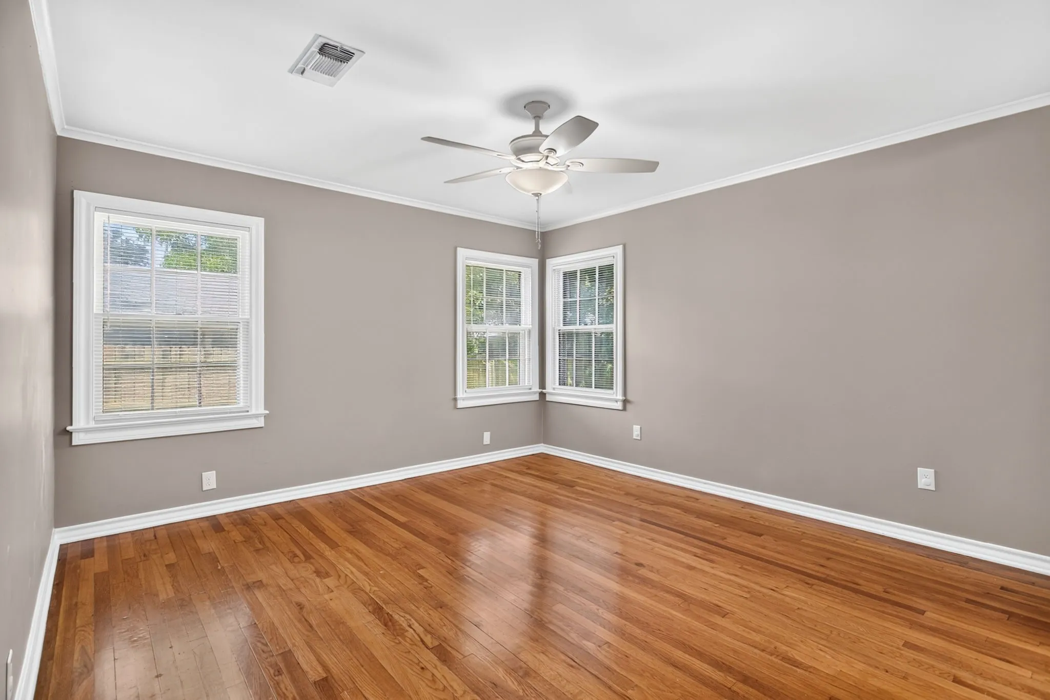 Another view. Still love the hardwoods, the original windows, the crown molding.