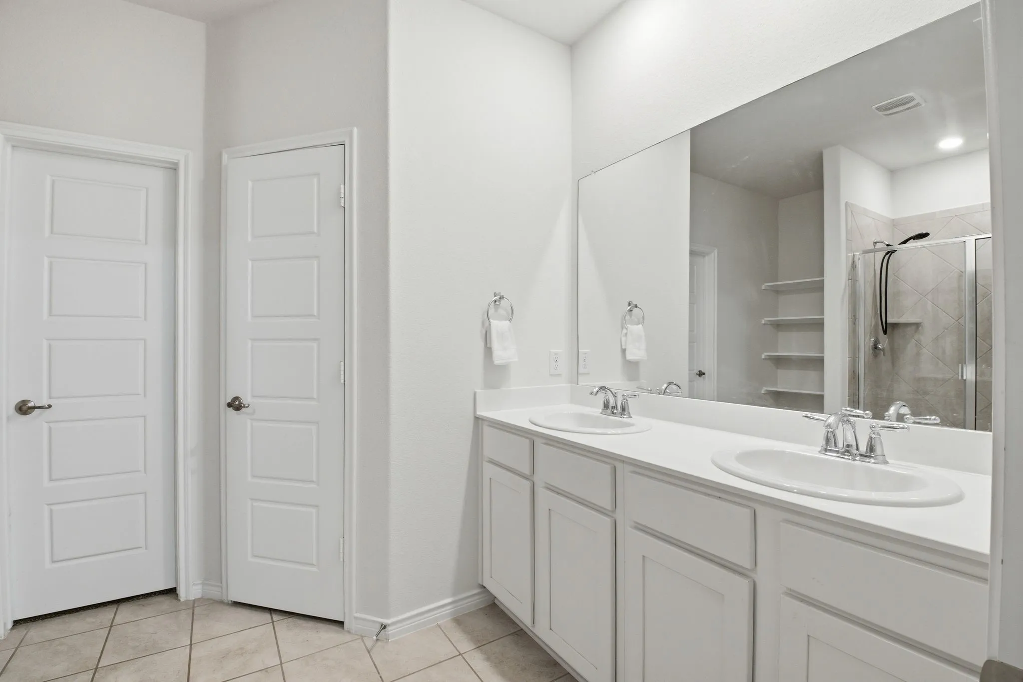 Primary Bathroom with Separate Toilet Room & Large Walk In Closet
