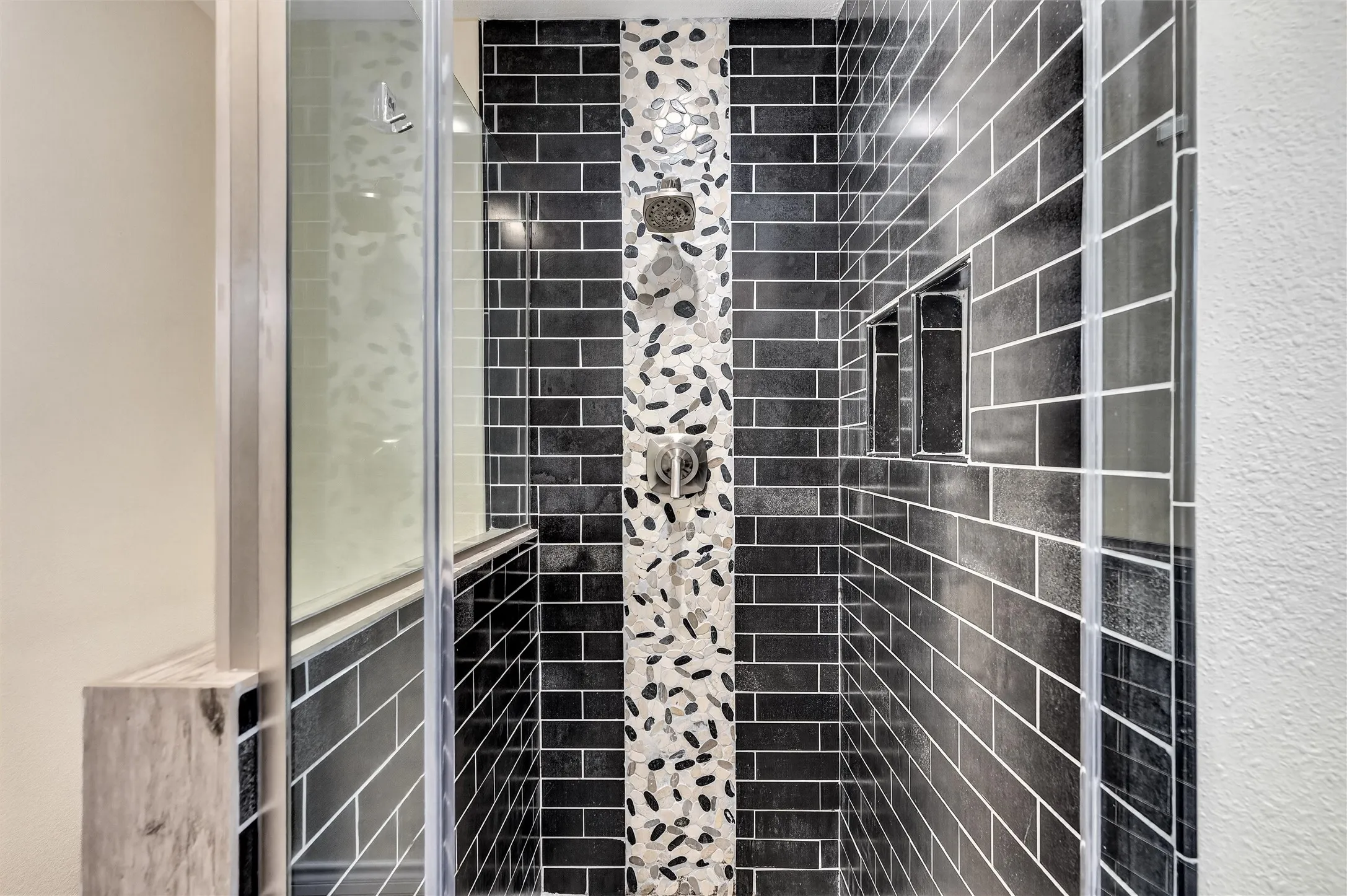 Spacious walk in shower with frameless glass