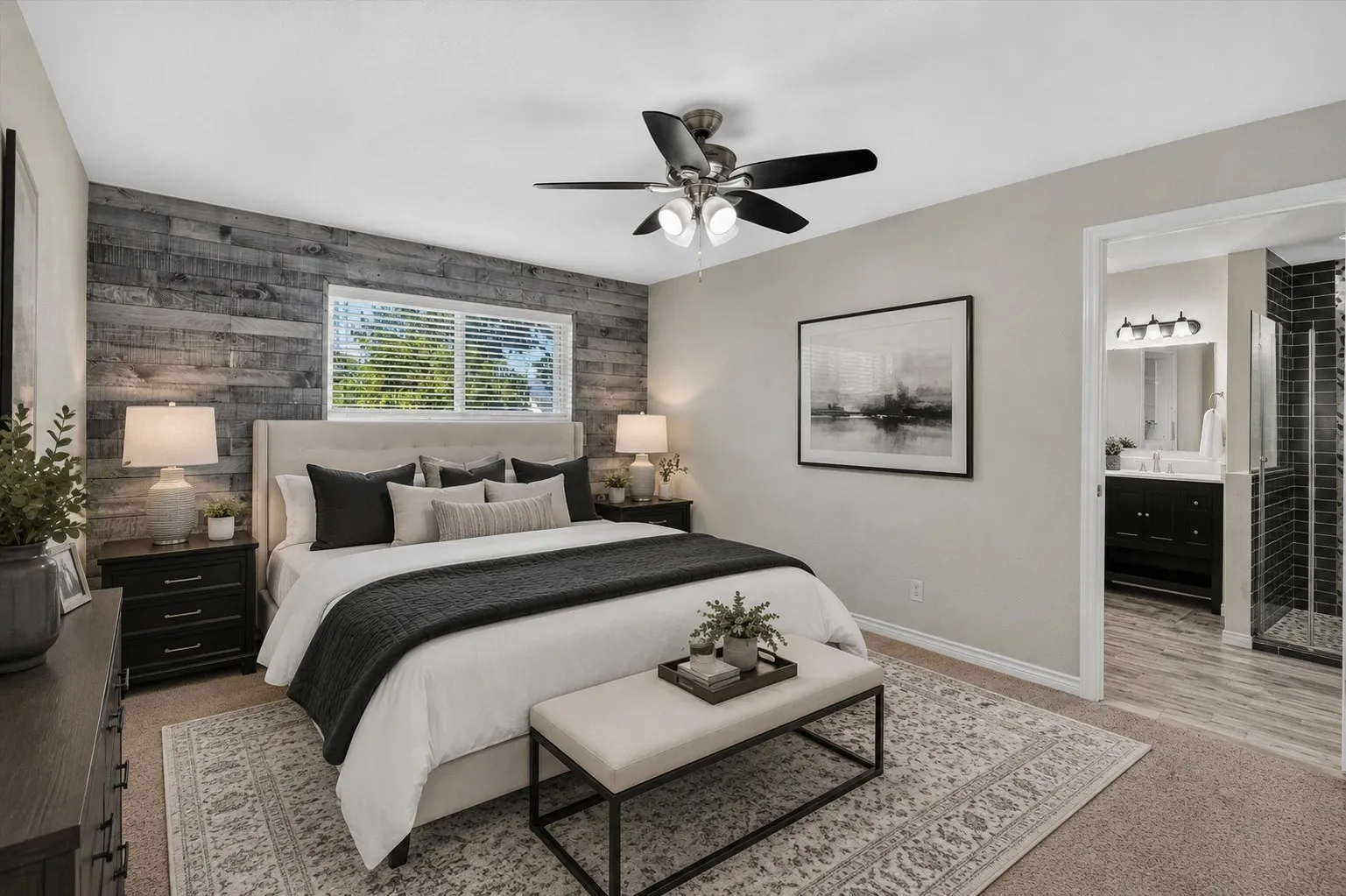 Primary Bedroom with ceiling fan - virtually staged