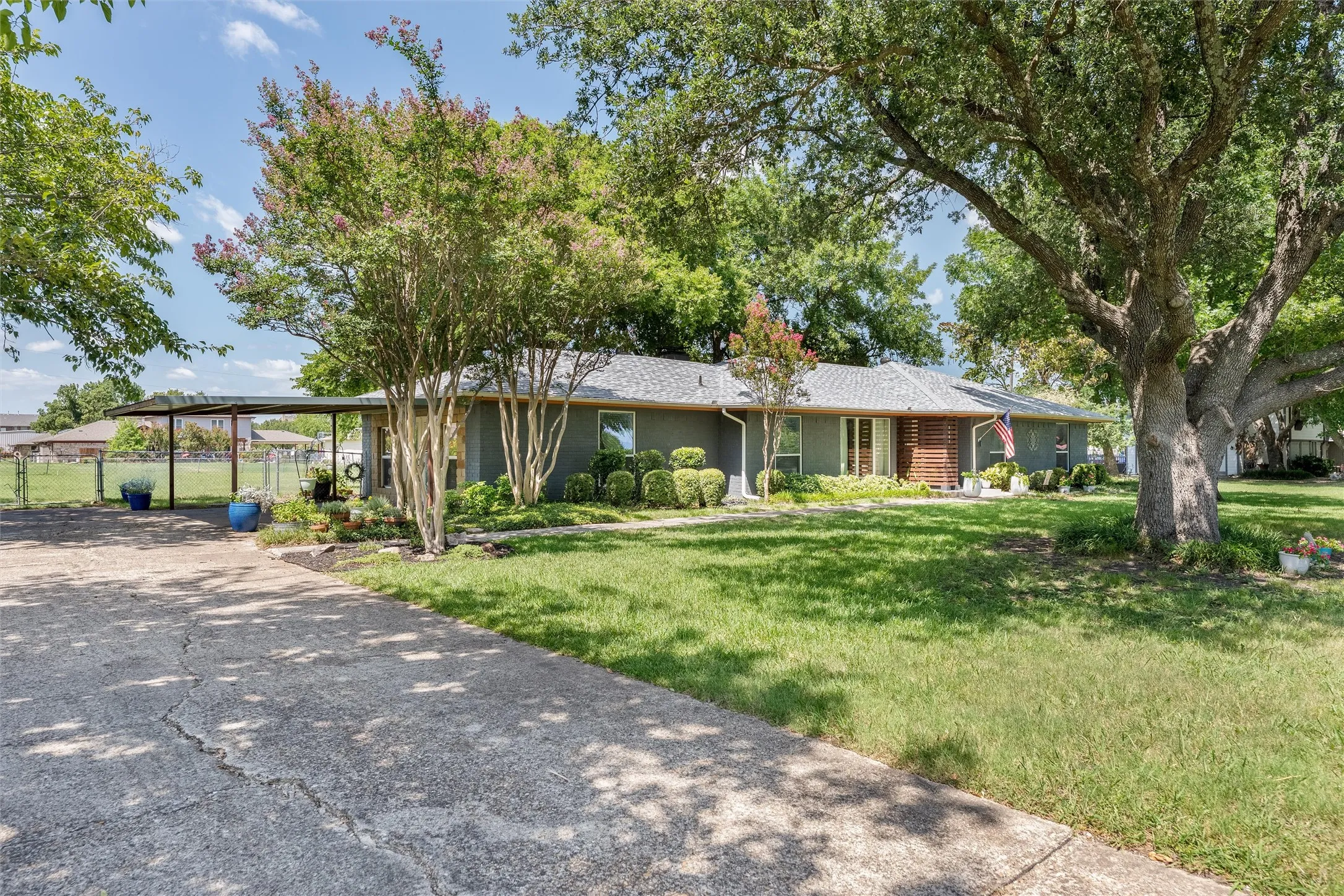Lovely trees and shade in front and back yard! New Class 4 High Impact Shingles on the Roof 2026