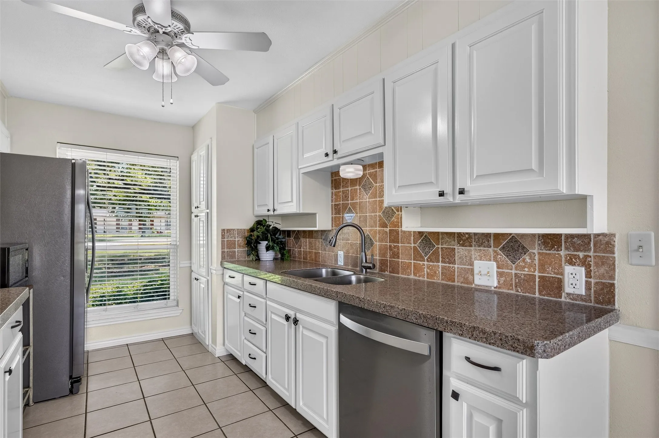 Newer stainless dishwasher and Stainless Fridge included with the home