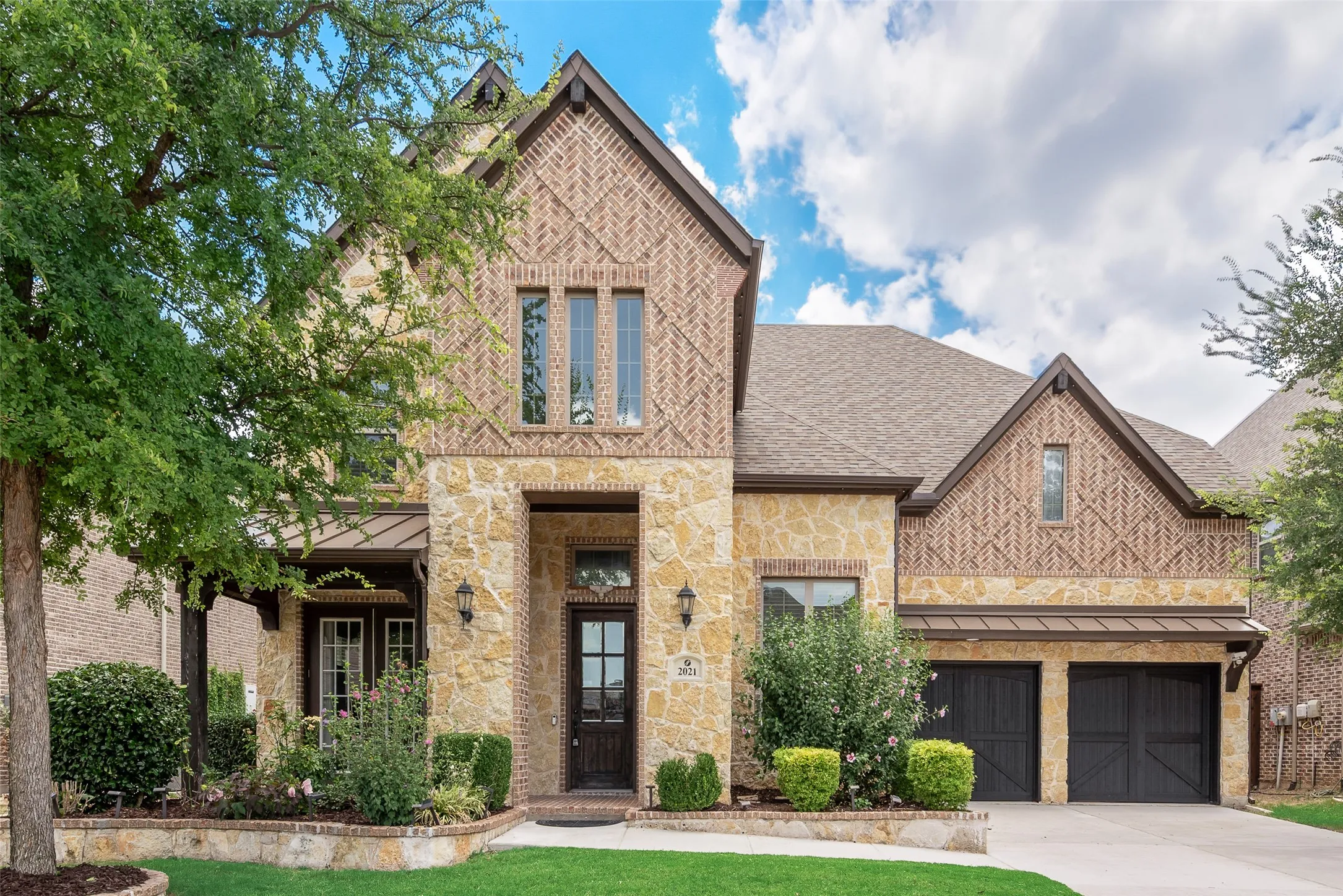 Stone and brick exterior with intricate brickwork patterns