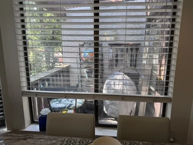 Balcony over looking one of the pools and the hot tub