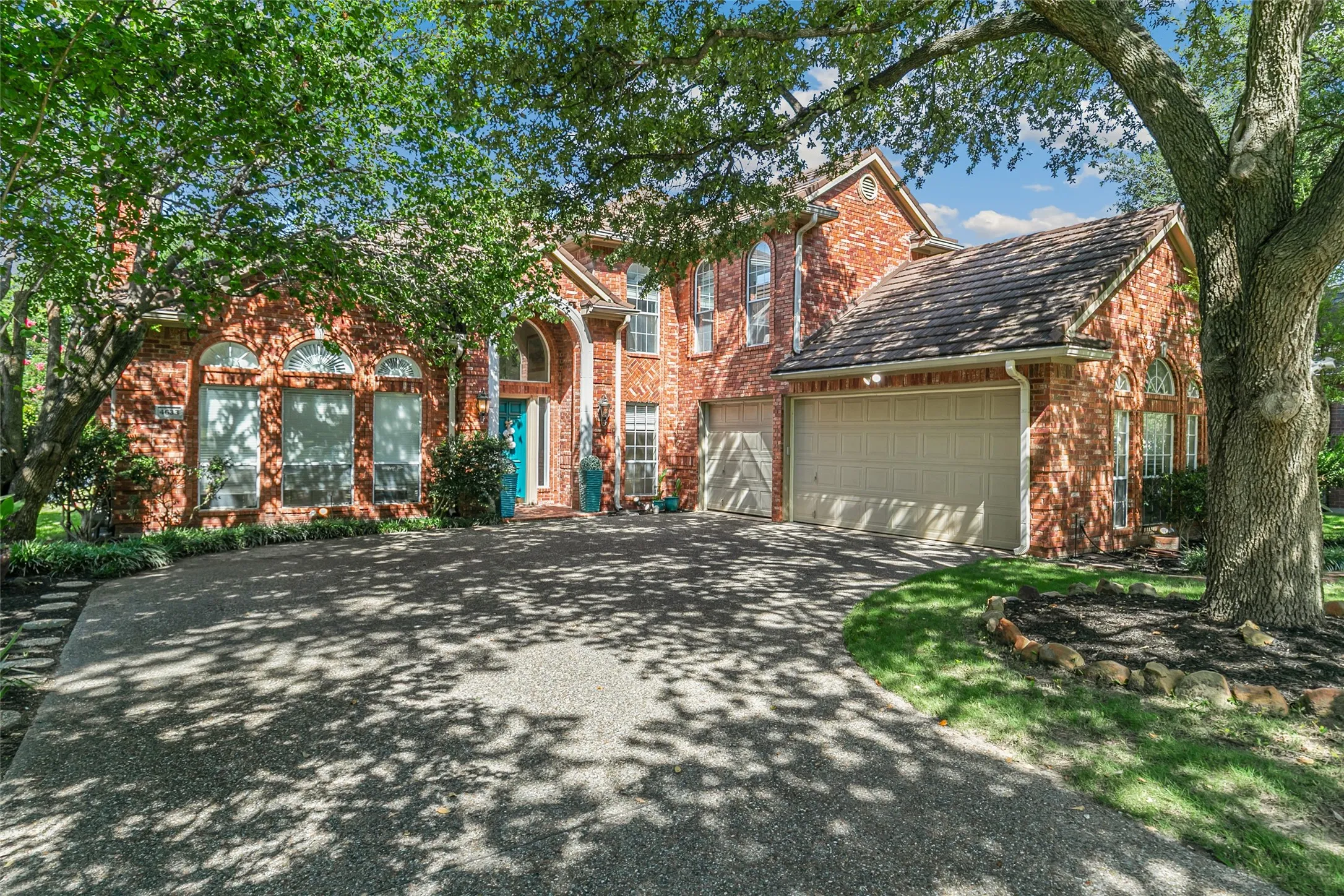 Oversized three car garage with extra storage space and closet