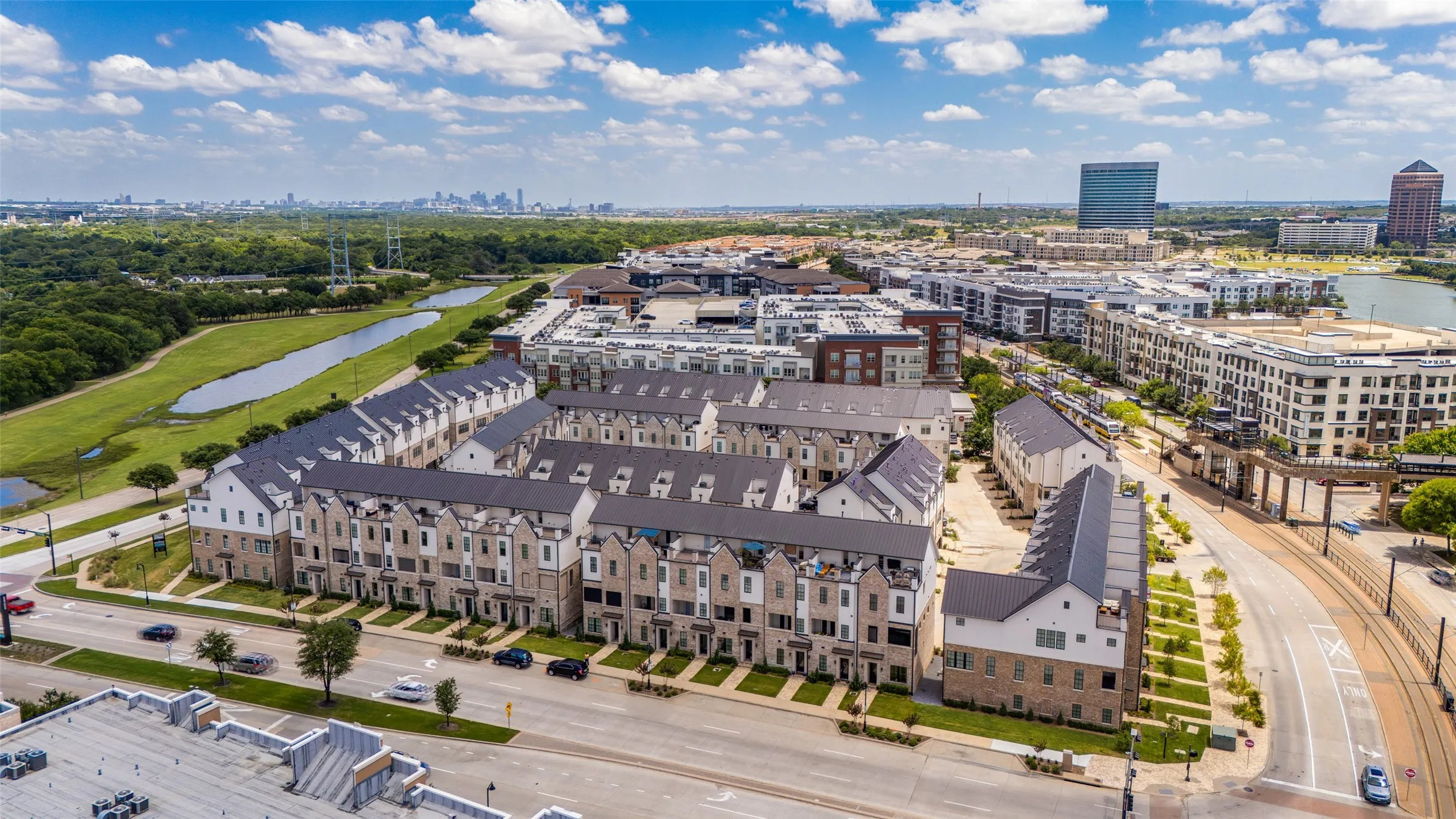 Modern townhome community featuring multi-story units with varied facades