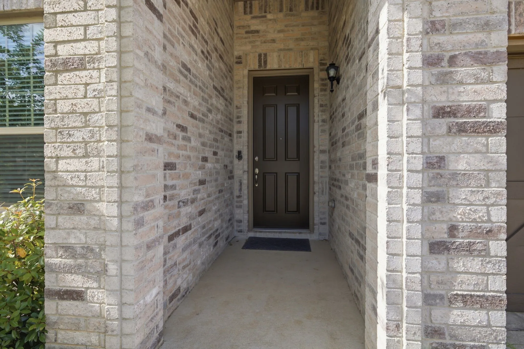 Brick facade with varied light and dark tones