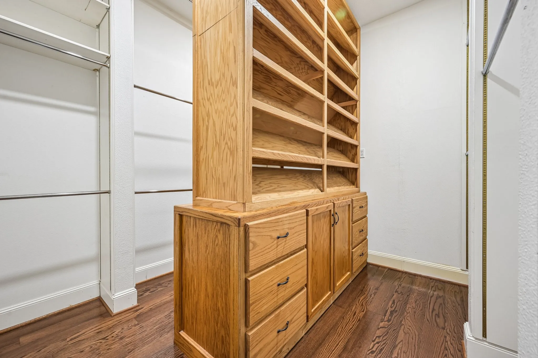 Massive primary closet with custom shelving
