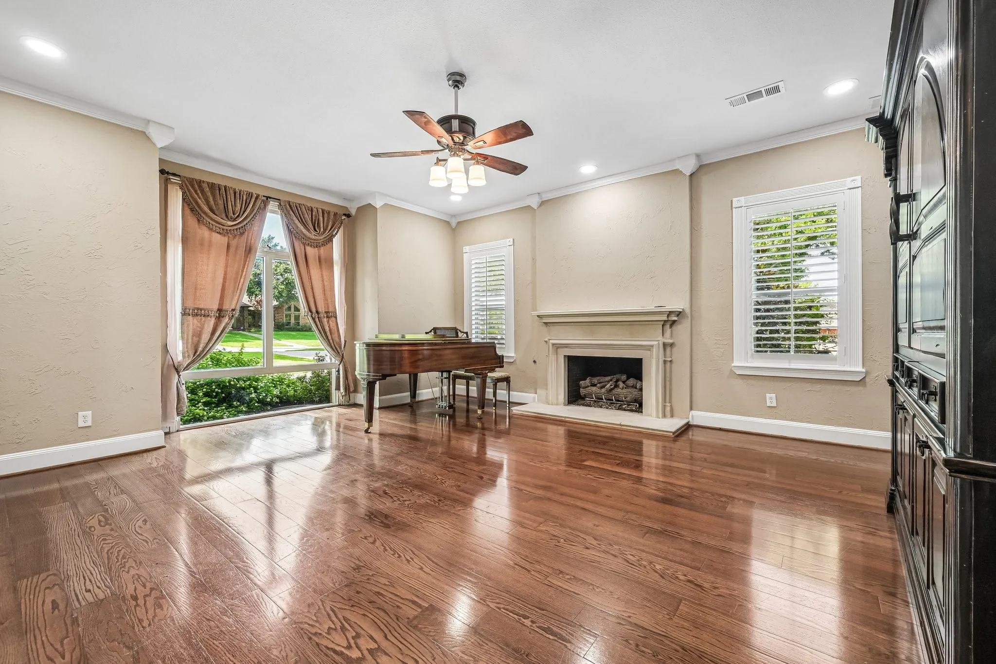 Elegant formal living room with stately fireplace