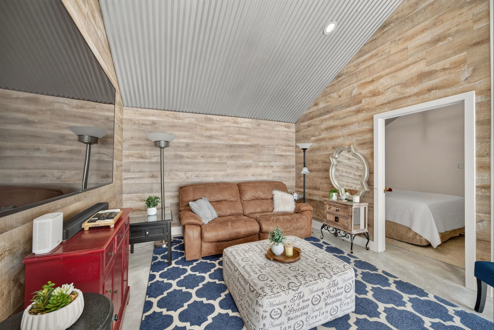 Vaulted ceiling with corrugated metal finish