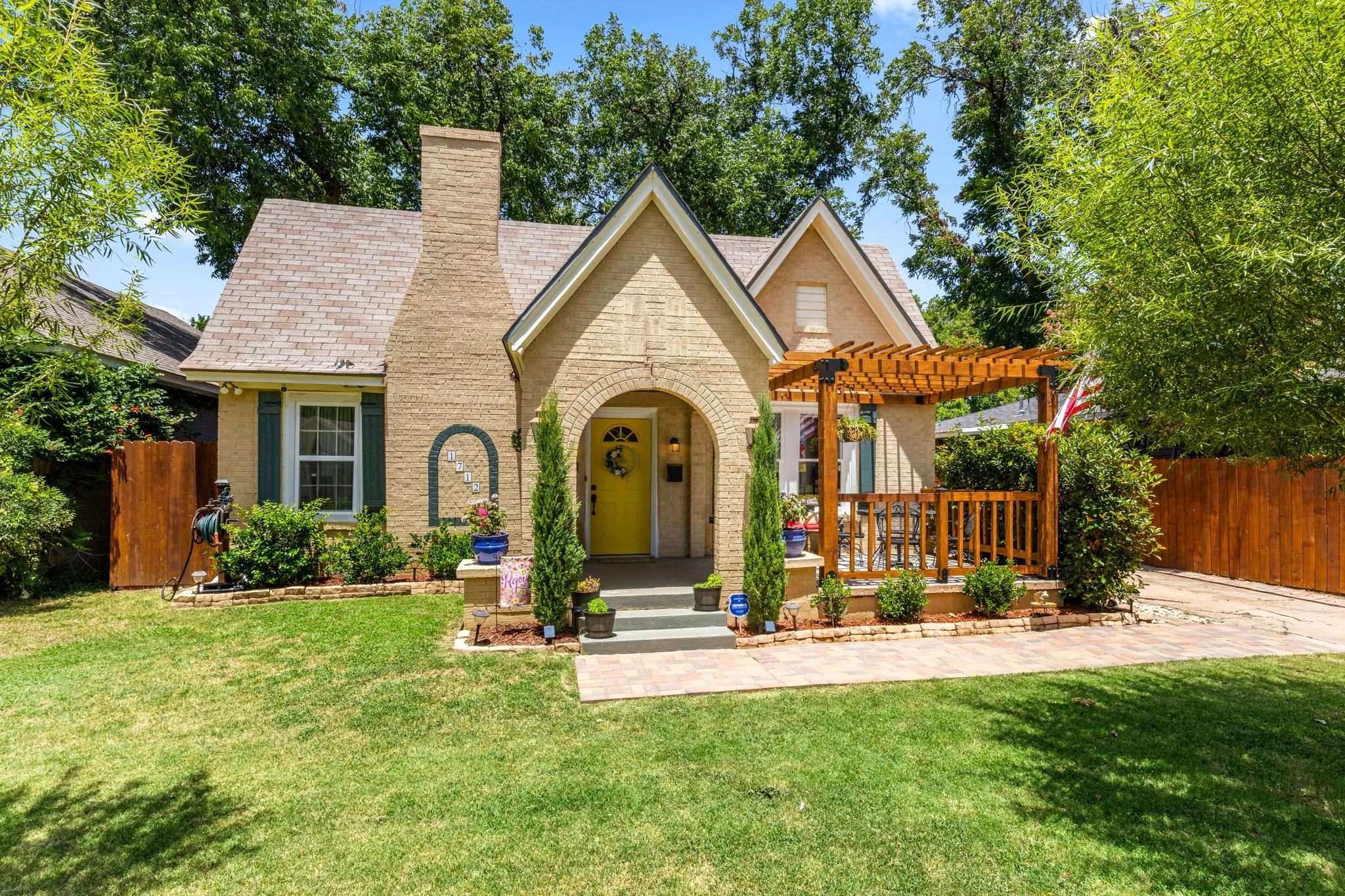 Landscaped yard and brick exterior