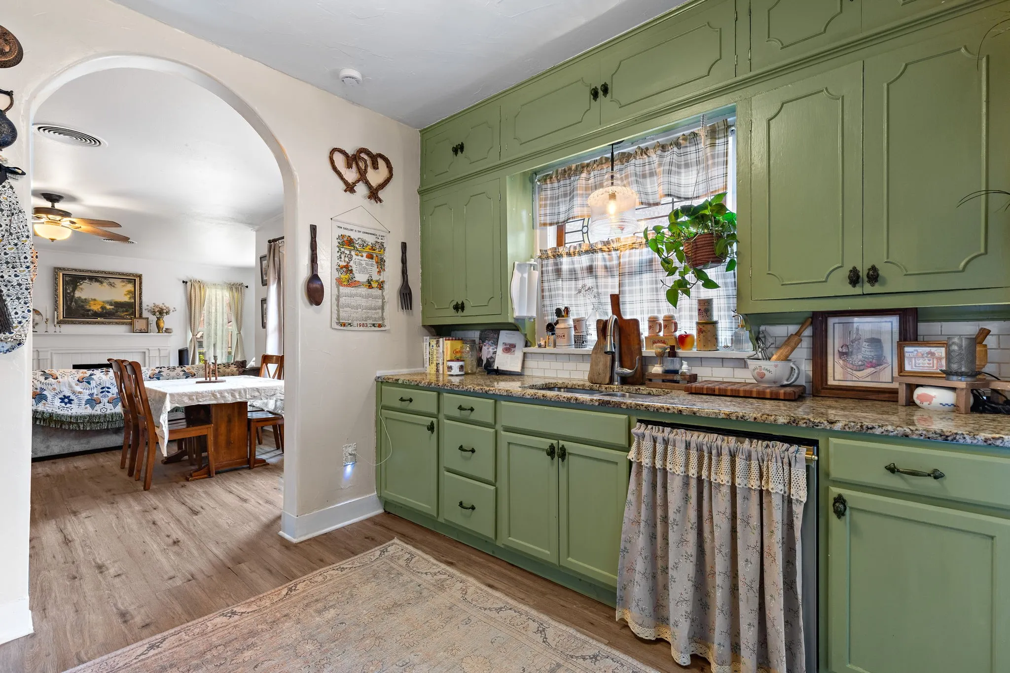 Granite counters and new arched entry in kitchen