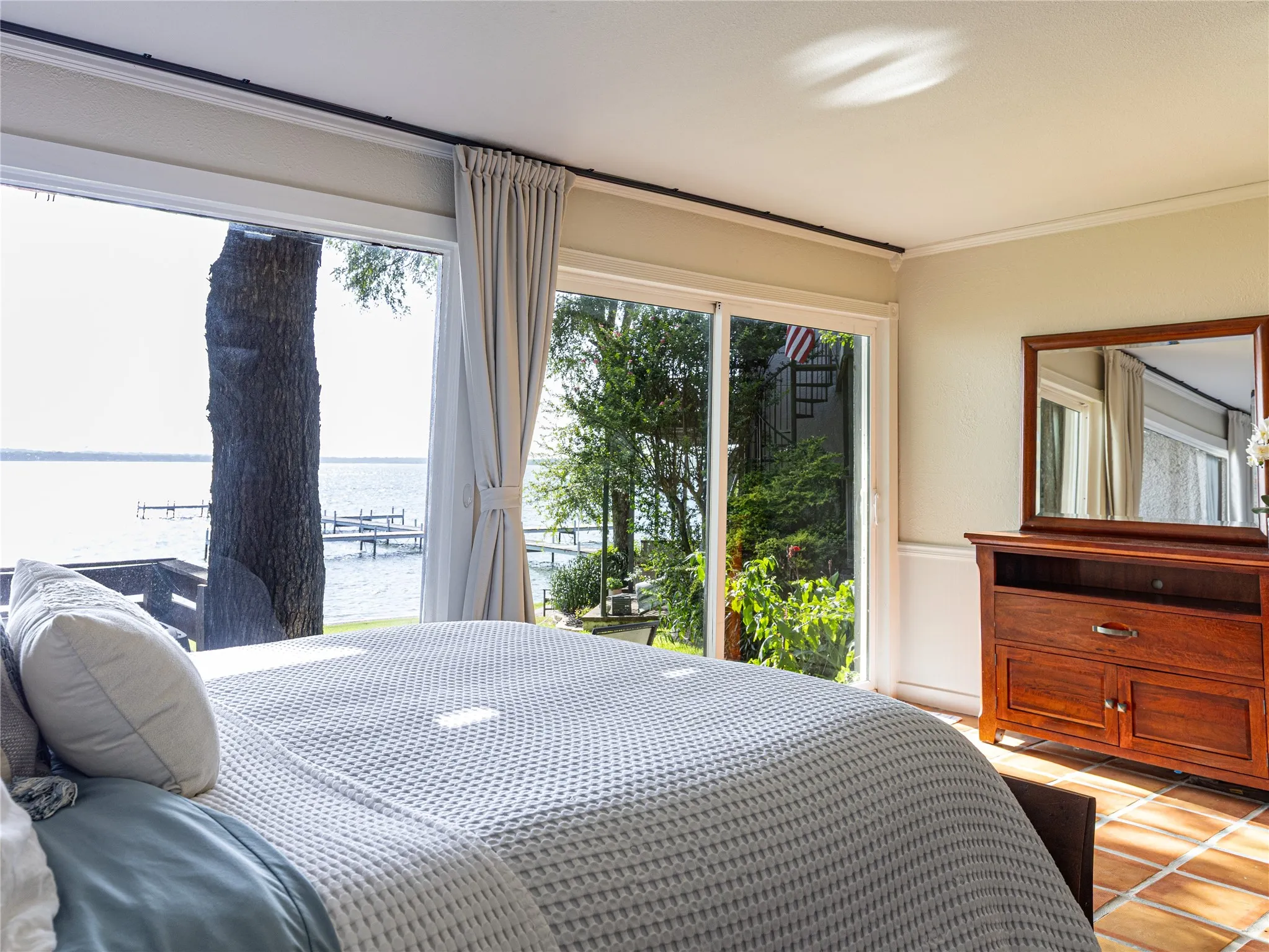 A primary suite designed for quiet reset after full days on the lake.