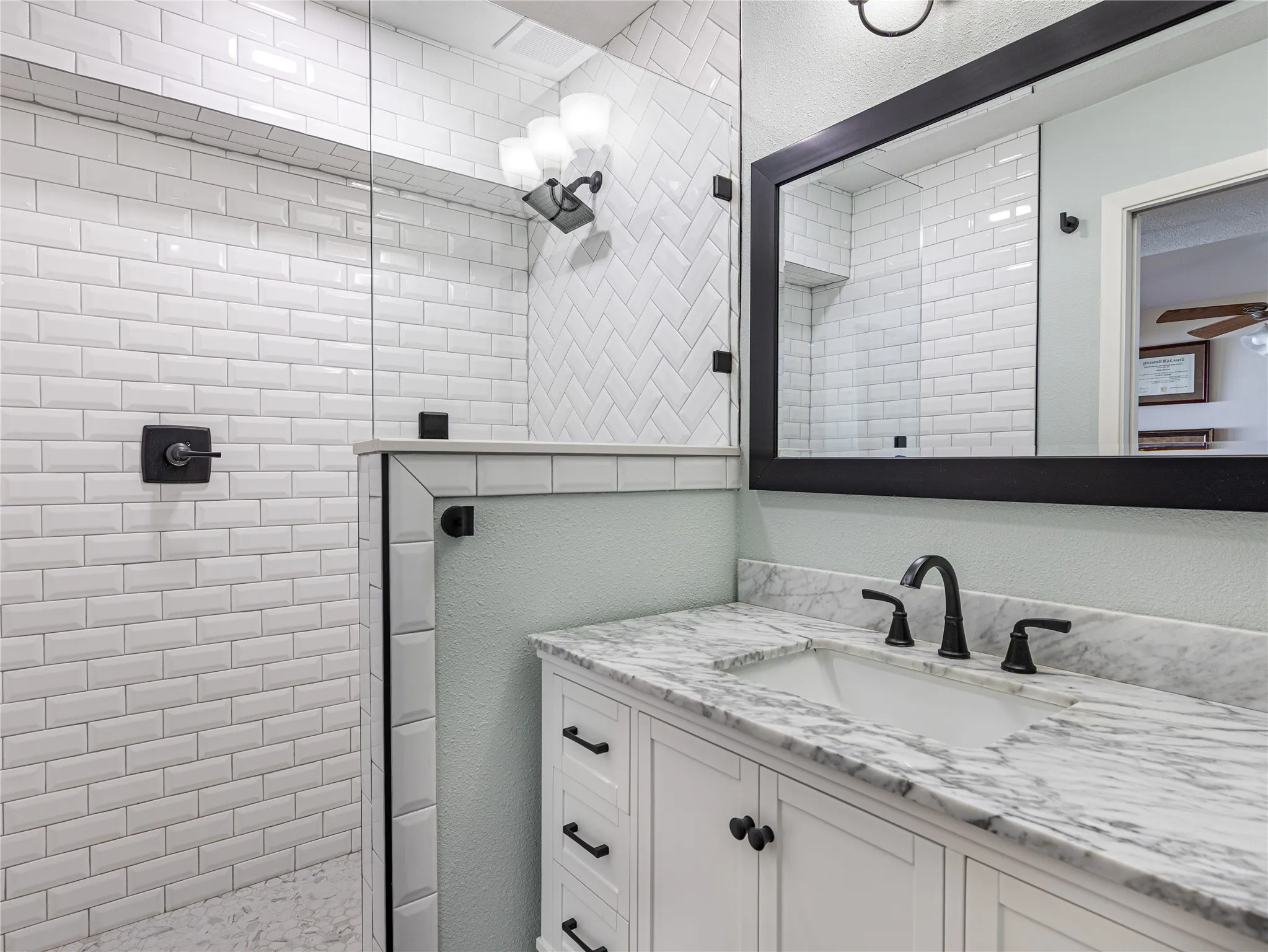 Walk-in shower and well-appointed finishes throughout.
