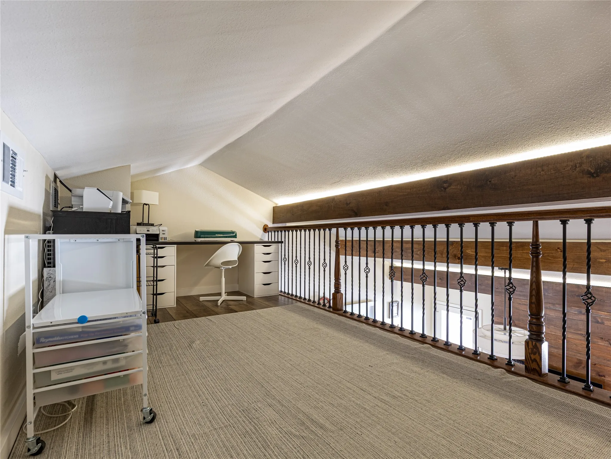 Spacious loft designed as a flexible extension of the home’s living space.