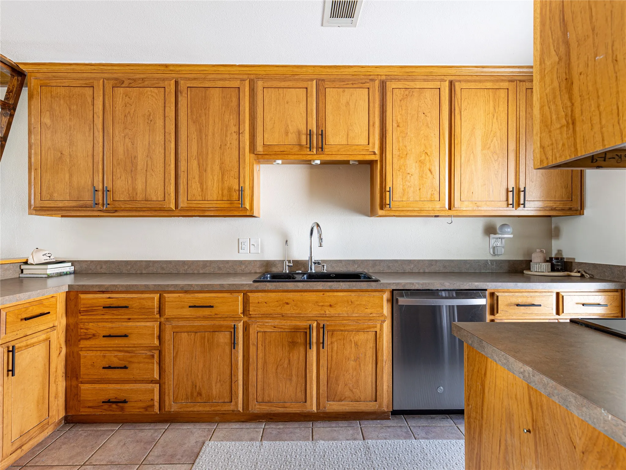Spacious kitchen filled with natural light and peaceful views of Eagle Mountain Lake.