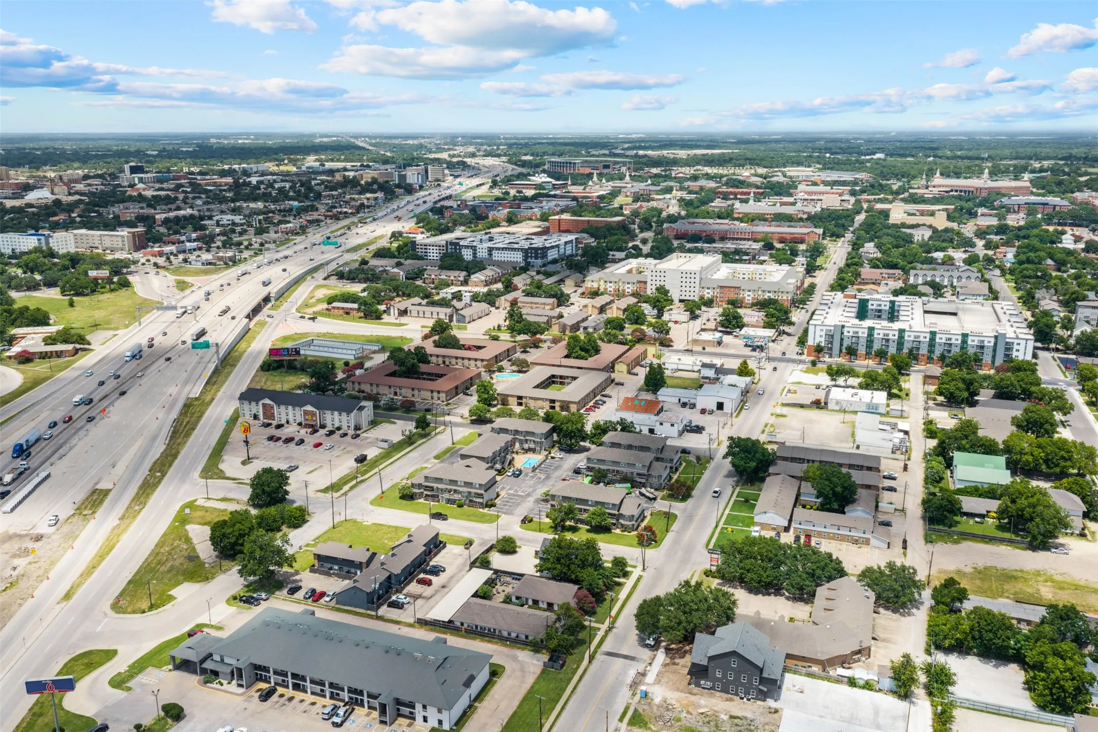 Aerial perspective showcasing a vibrant urban landscape with diverse architectural styles