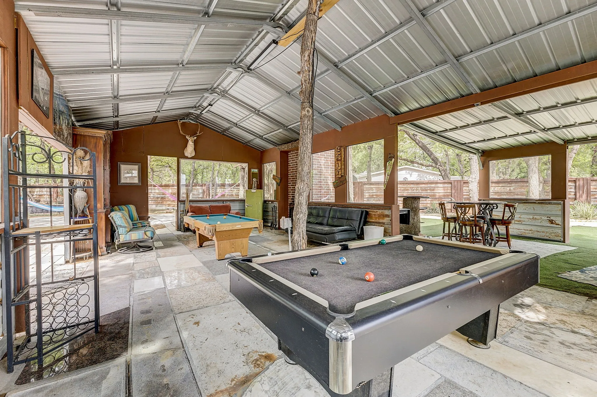 Recreation room featuring billiards and vaulted ceiling