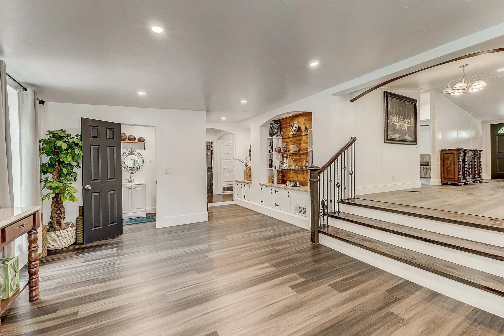 Large open Living room featuring luxury vinyl flooring